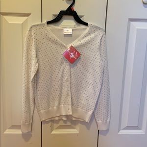 100% cotton, cream-colored cardigan size 8 girls.